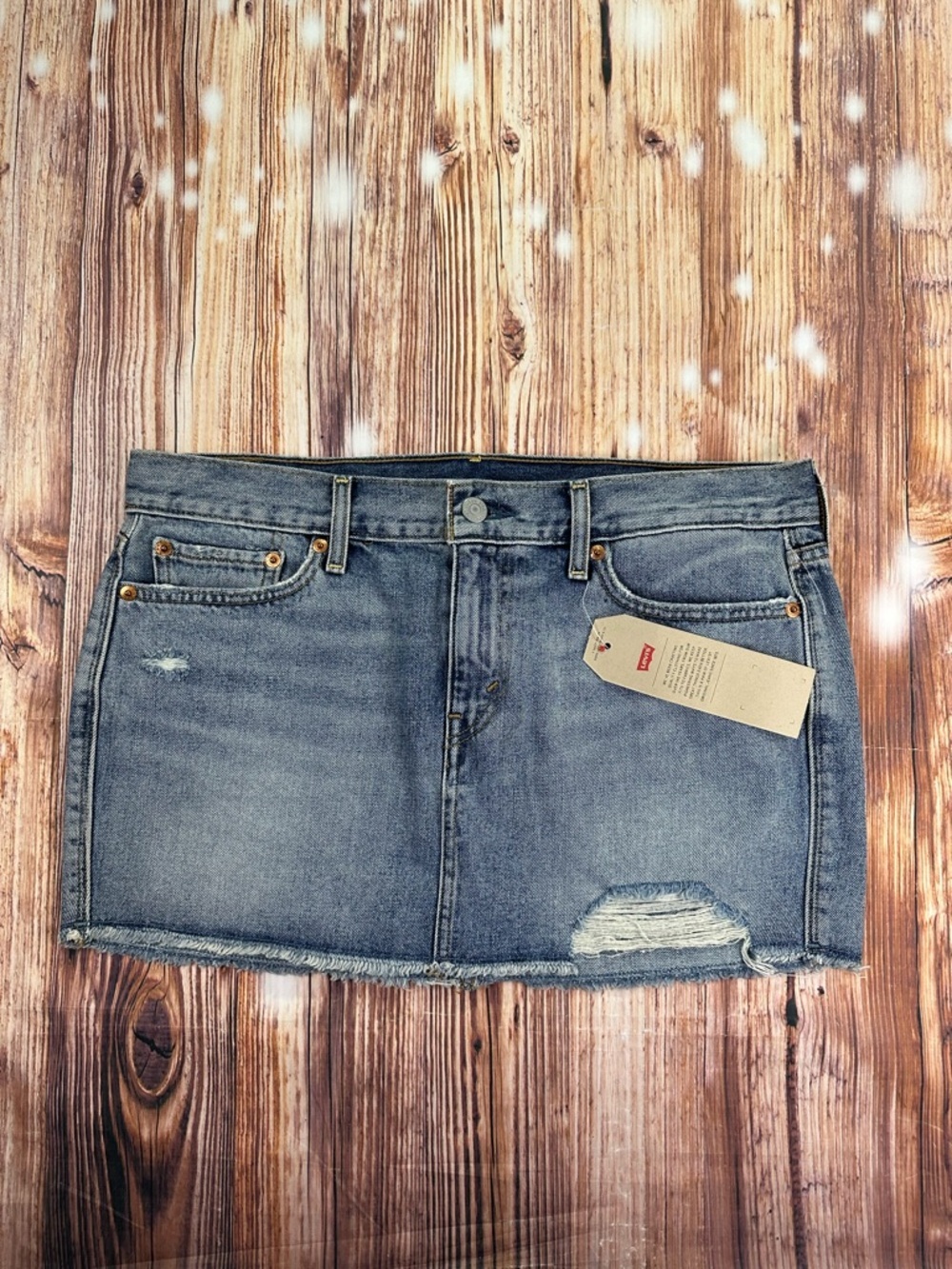 NWT Levi's Blue Denim Distressed Mini Skirt
Size 29
